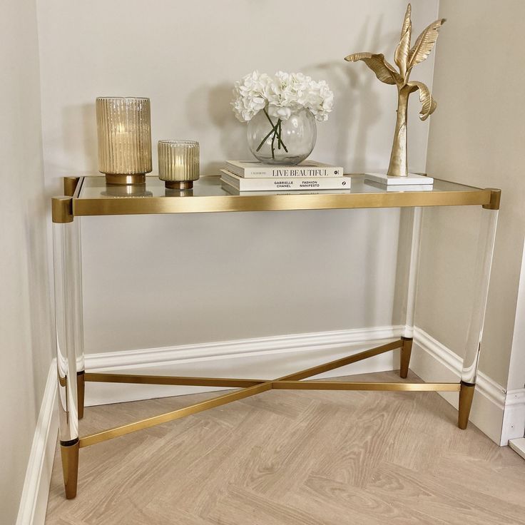 Corlia Gold Console Table With Tempered Glass Top for The Artisan Craft Behind Elmore Console Table and Its Golden Elegance