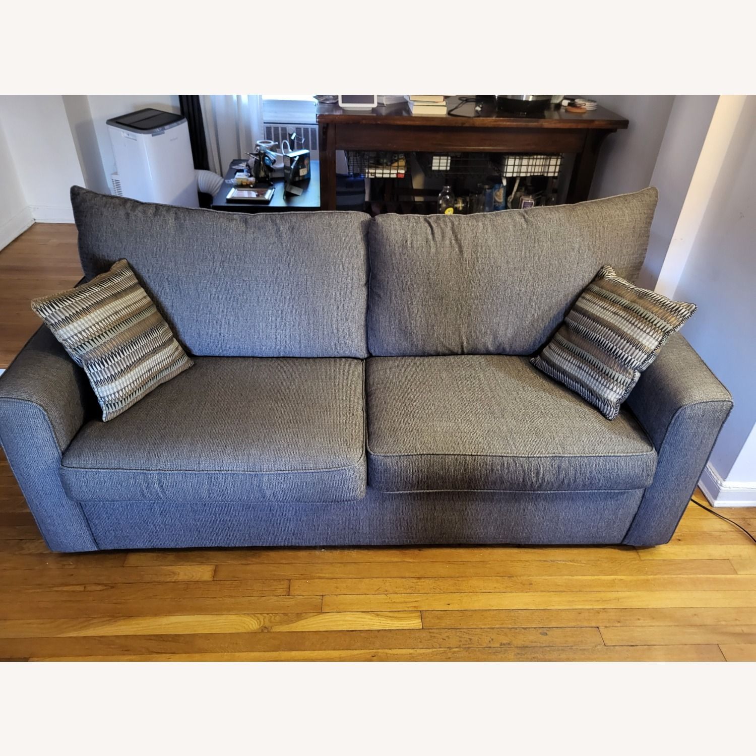 Raymour & Flanigan Grey Sleeper Sofa - Aptdeco within Grey Sleeper Sofa With Linen Upholstery, Scrolled Arms, And Memory Foam Mattress