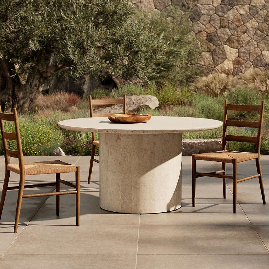 Athens 60" Round Marble Outdoor Dining Table | Crate &amp; Barrel Canada pertaining to The surprising resilience of concrete and resin tops that mimic hand-carved marble for patios