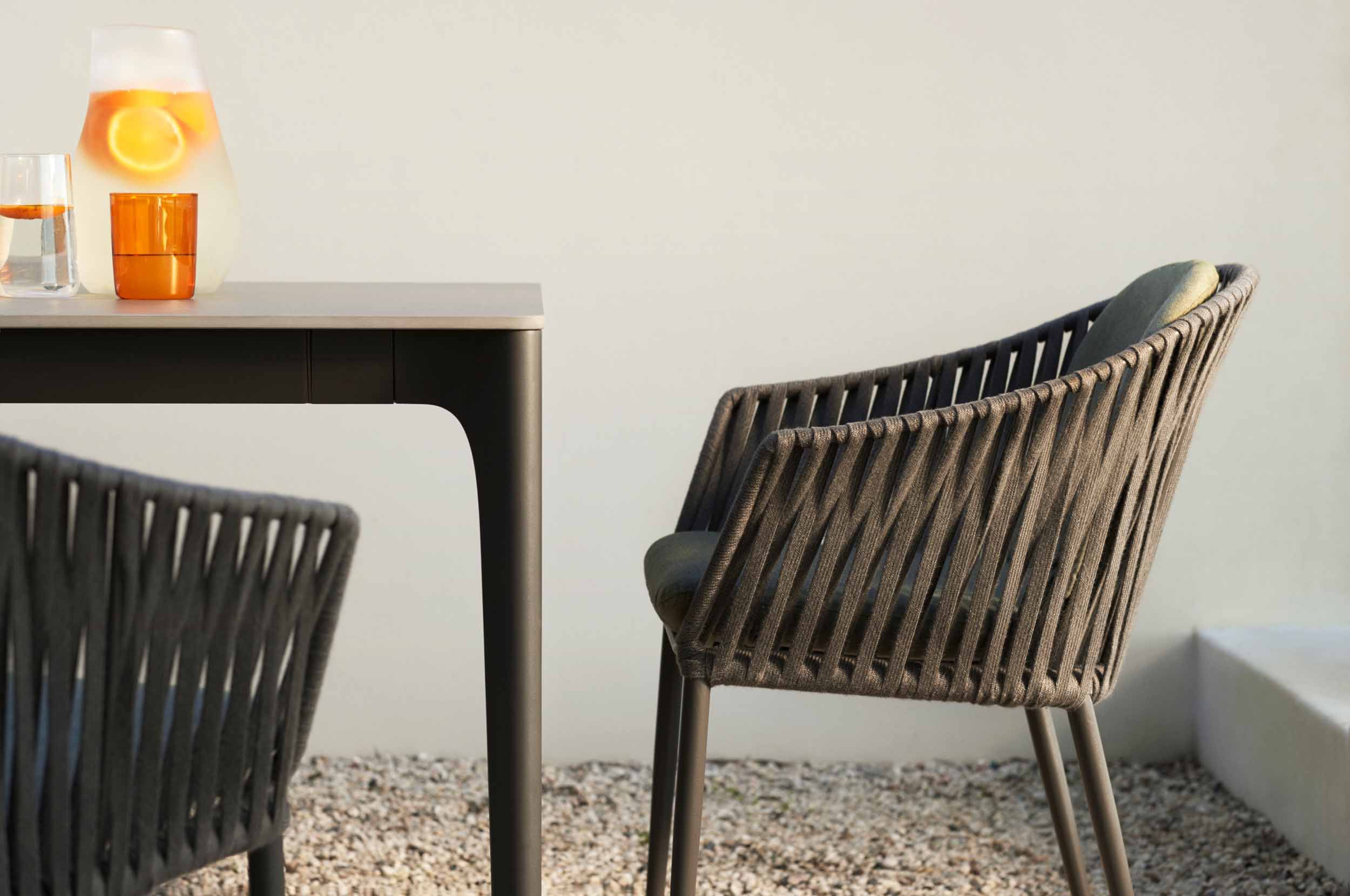 Quay Outdoor Woven Dining Chair With Back Cushion in The Rise of Sustainable Materials in Outdoor Woven Dining Chair Design
