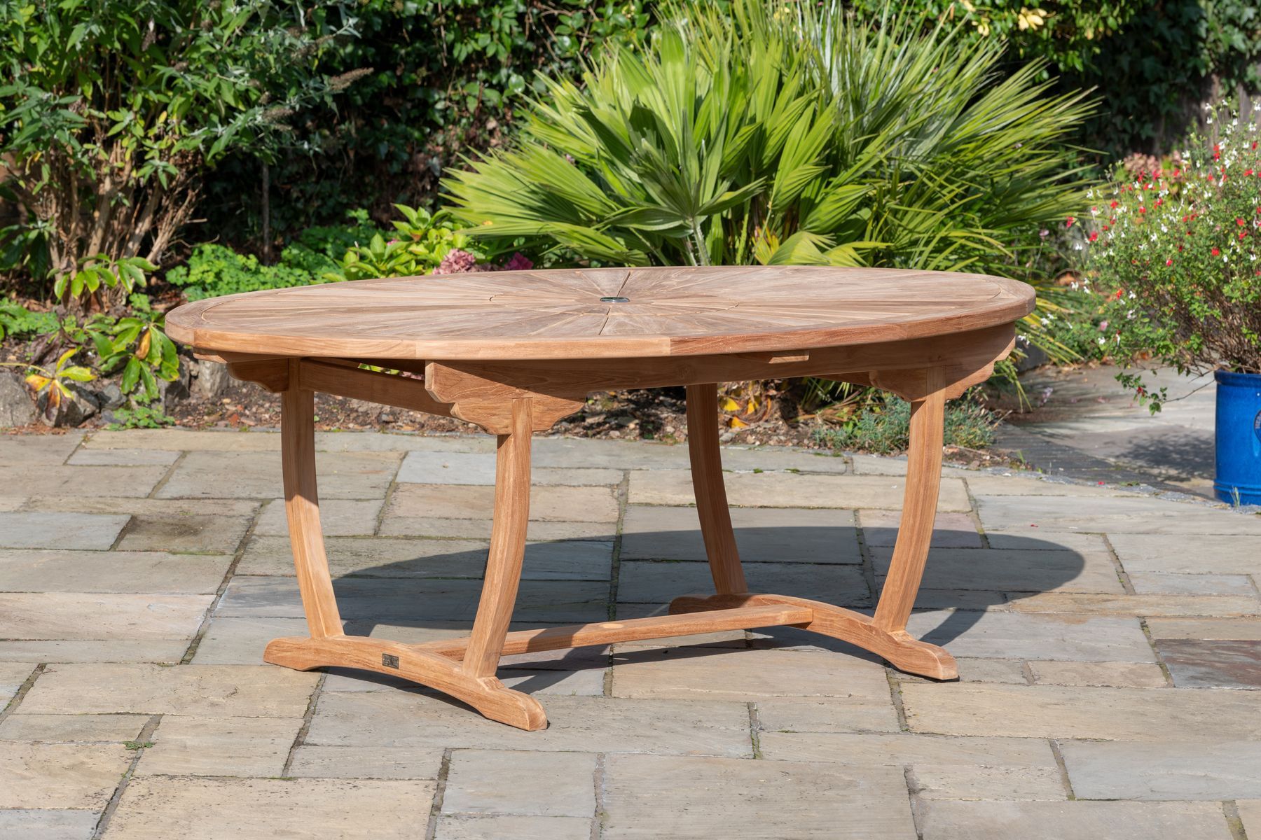 Sheringham Outdoor Oval Wooden Dining Table intended for The Truth About Umbrella Holes and Stability in Contemporary Oval Design