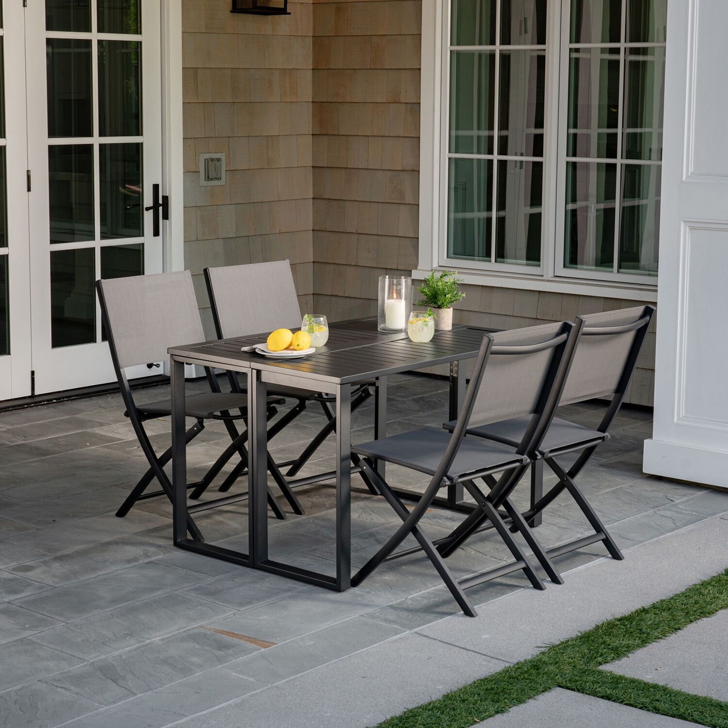 Hanover Conrad 5-Piece Compact Outdoor Dining Set | 4 Folding Sling ... throughout The Real Difference Between Cheap and Quality Foldable Outdoor Dining Sets