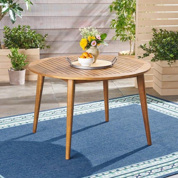 Noble House Stamford Teak Brown Round Wood Outdoor Patio Dining Table ... with Round Wood Outdoor Dining Table