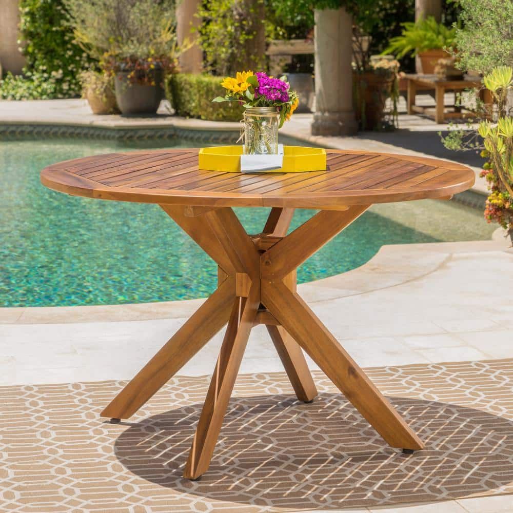 Noble House Teak Brown Round Wood Outdoor Dining Table 11974 - The Home ... with regard to The Hidden Durability Secrets of Acacia and Teak Patio Tables